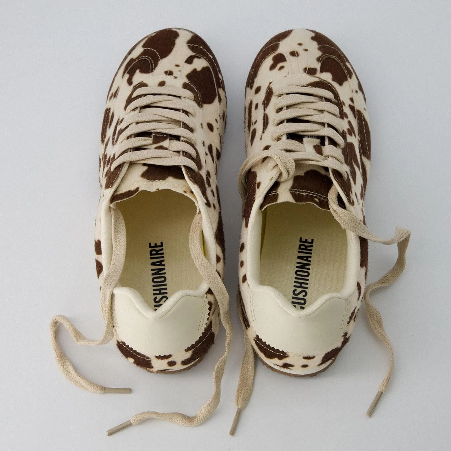 CUSHIONAIRE Techno Women’s Vegan Cow Print Calf-Hair Lace-Up Sneakers with Memory Foam Comfort